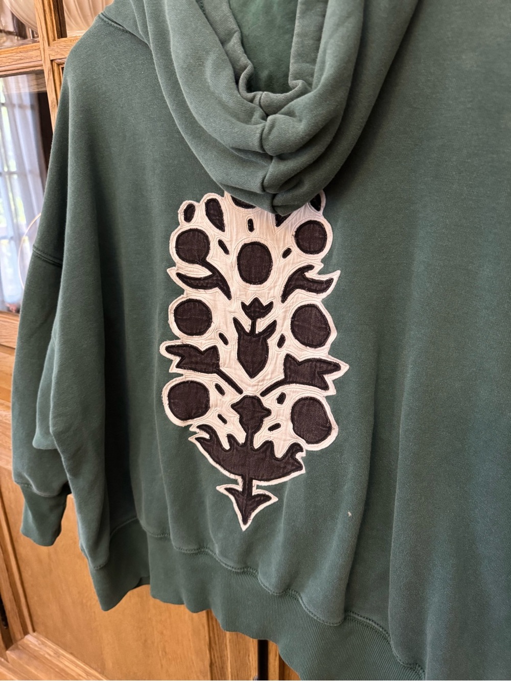 Free People Forest Green Hooded Sweatshirt with Cream & Black Embroidered Motif